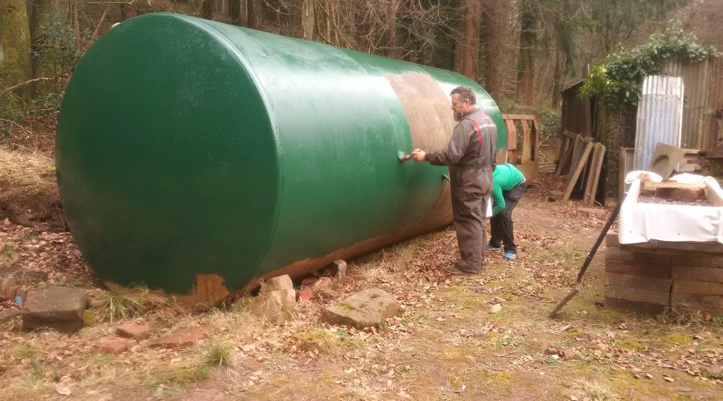 Richard and James painting the tank